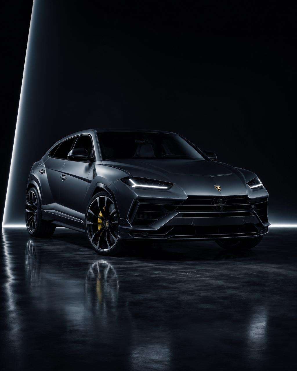 Lamborghini Urus with sharp angular lines in dark cinematic studio