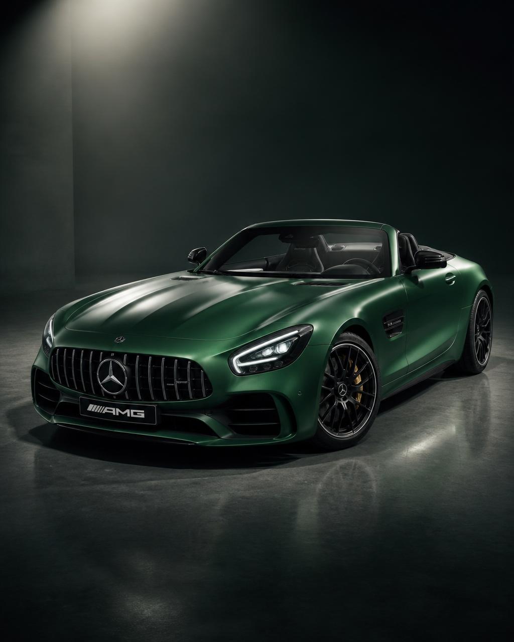 Mercedes AMG GT Roadster in matte emerald green studio lighting